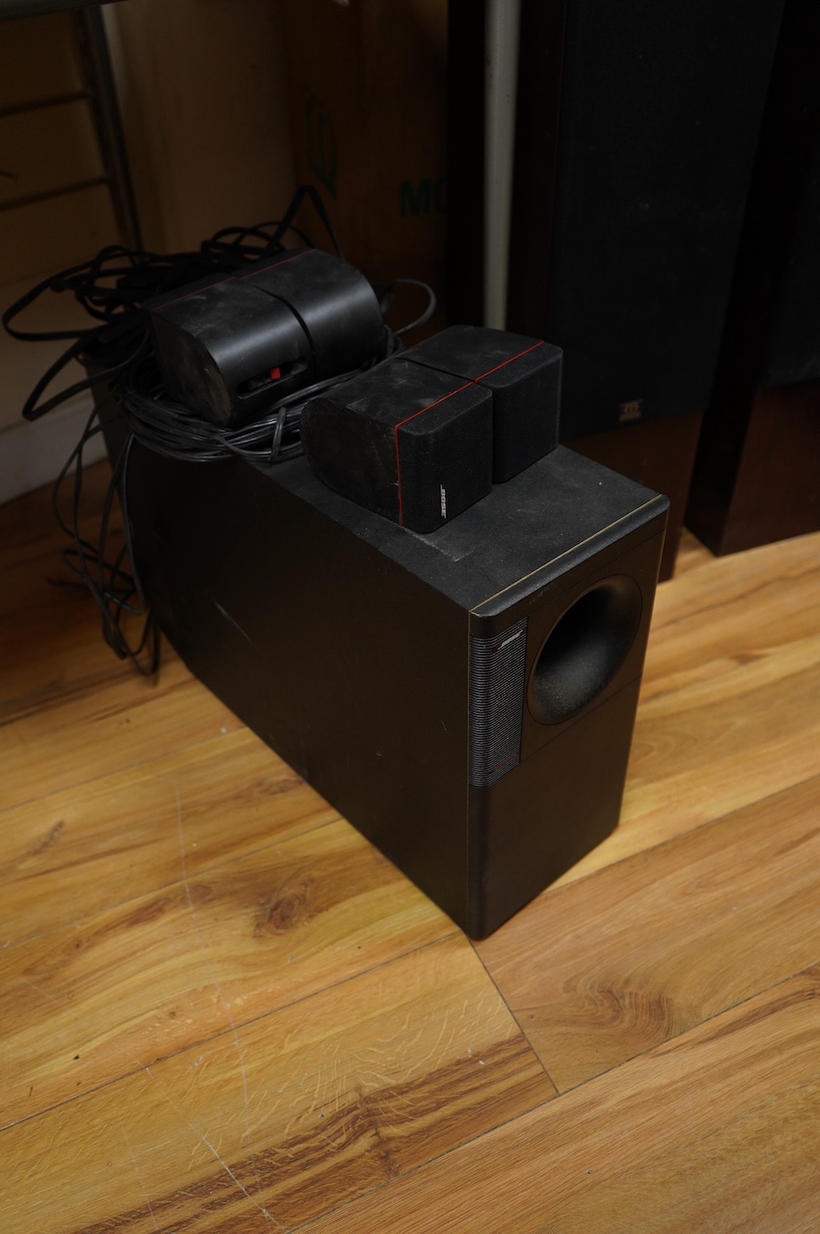 A pair of Monitor 14 loudspeakers, a Denon PMA-880R amplifier, a Denon TU-560L AM-FM tuner, a Bose subwoofer and a pair Bose Red Line cube swivel speakers, the. Denon and Monitor items are in their original card boxes.